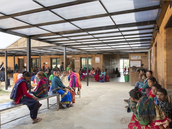 Outdoor waiting rooms are sheltered with breezeways to protect patients.