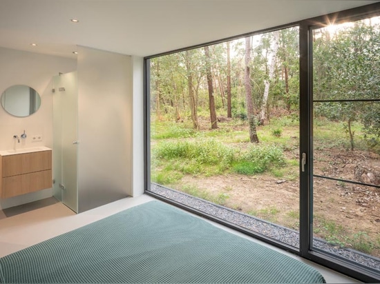 This Modern Cabin Has Both The Roof And Siding Entirely Covered By The Same Wood