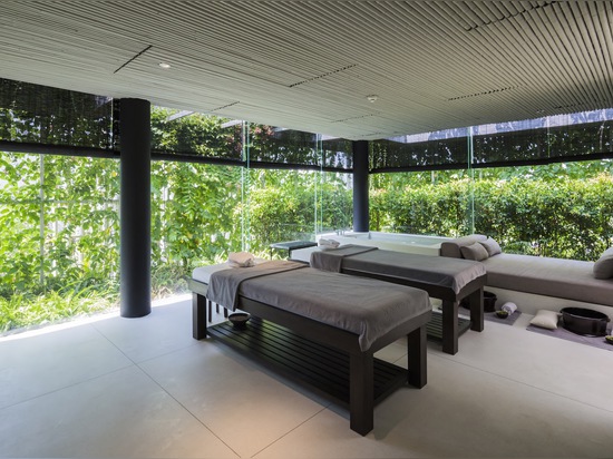 Lush living plants engulf the green-roofed Pure Spa in Vietnam