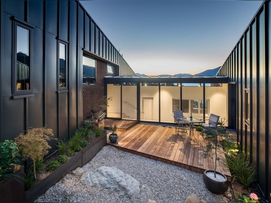 This Hillside Home With Black Metal Siding Was Designed To Maximize The Lake Views