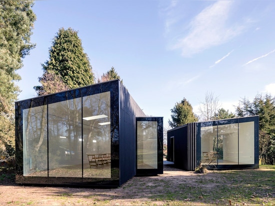 The slanted roofs come with integrated rainwater collection system that allows the artists couple to store it and use it for their beautiful large garden.   Read more: Soup Architects create stylis...