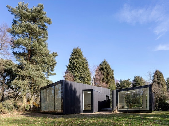 While he needed a bigger space for his large paintings, she required a smaller scale shelter for making sculptures.   Read more: Soup Architects create stylishly energy-efficient Garden Studios for...