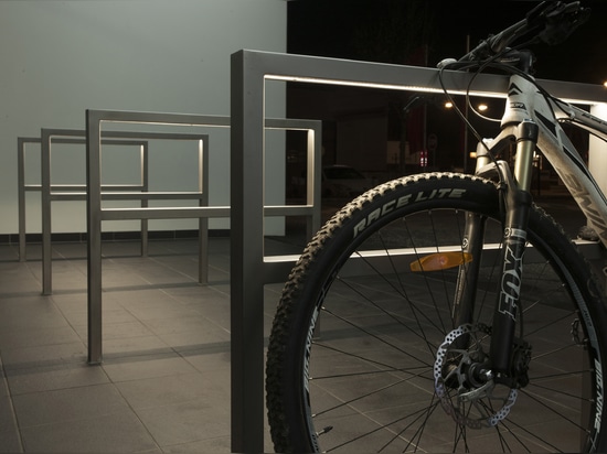 Bicycle rack made of stainless steel with integrated LED-strip