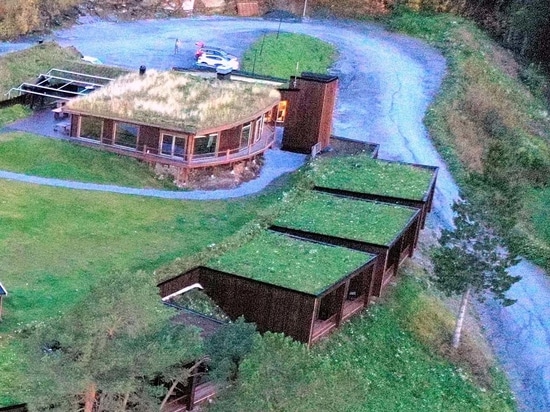 A Large Green Roof Allows The Rooms Of This Hotel To Blend Into The Landscape