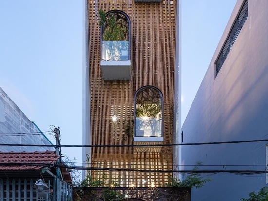 Metal Screens With A Leaf Motif Adorn Both The Interior And Exterior Of This Home