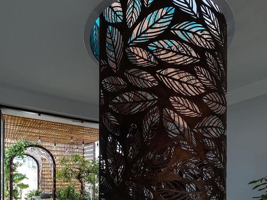 Metal Screens With A Leaf Motif Adorn Both The Interior And Exterior Of This Home