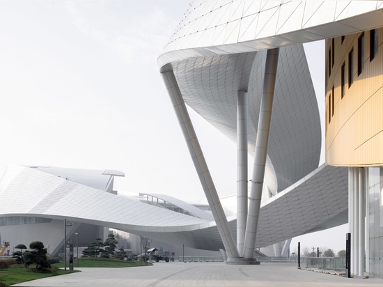 The sweeping structure unites two wings of the building