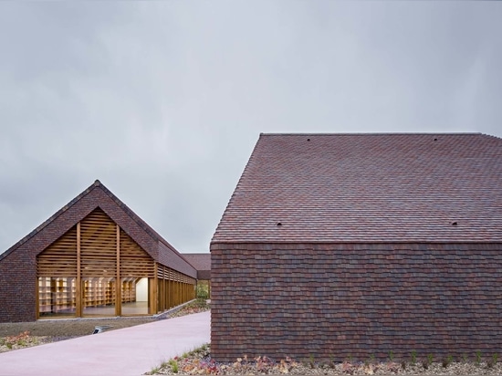 Social and cultural center of Gonzague dressed in clay tiles