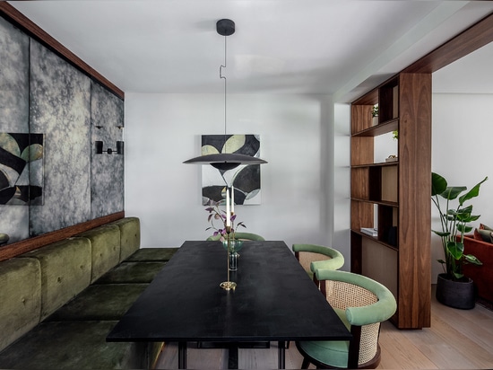 The ground floor dining area features banquette seating