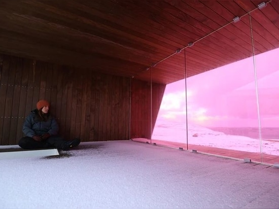 A timber-clad viewpoint designed by Biotope opens in Norway's arctic landscape