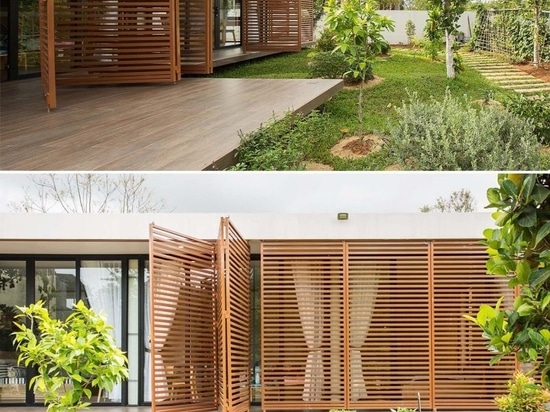 Operable Metal Screens Wrap Around The Exterior Of This Home