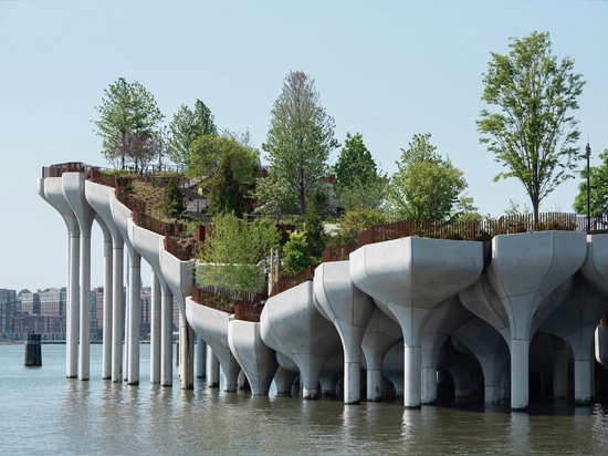 The precast concrete planters are formed of modular "petals"