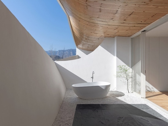 The deep balconies are private enough to have outdoor bathtubs