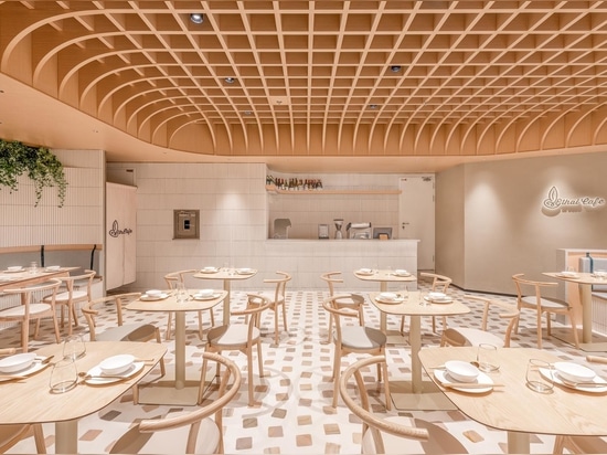 A Grid-Shaped Wood Ceiling Covers This Cafe In China