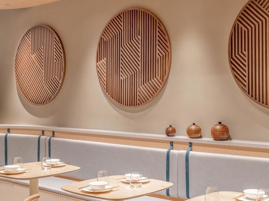 A Grid-Shaped Wood Ceiling Covers This Cafe In China