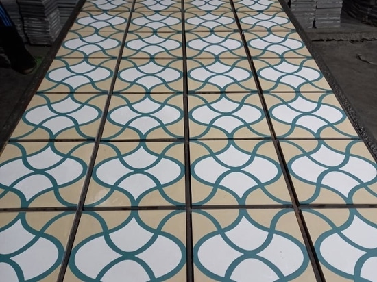 Embossed encaustic cement tile