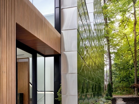 A 40 Foot Glass Wall Folds Open To Connect The Interior And Exterior Spaces Of This Home