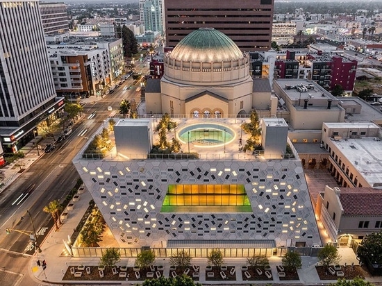 a sunken garden connects the third floor to a rooftop event space with views across Los Angeles