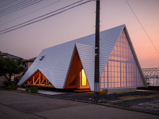 Multiple A-Frame Openings Add Light And Ventilation To This Home With A Wood-Lined Interior