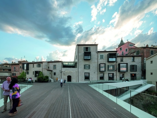 view of the converted townhouses from the cantilevered plaza