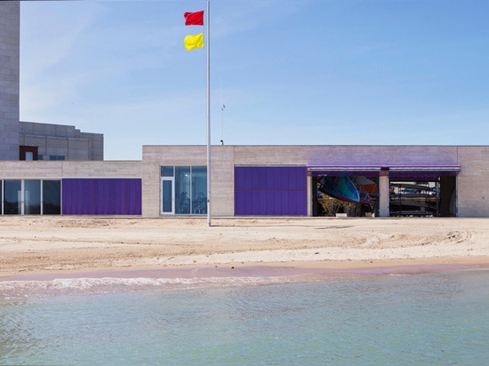 the building is composed of staggered concrete blocks