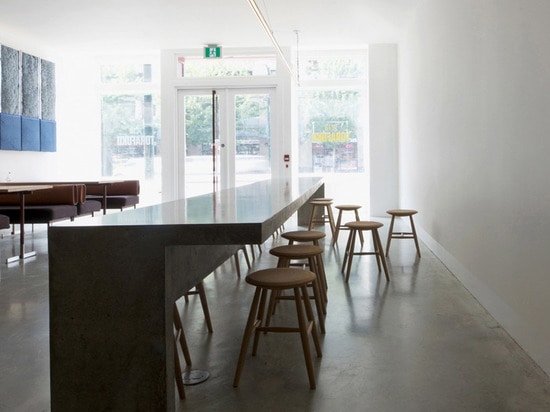 long communal bar and stools