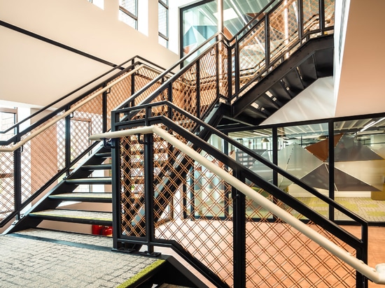 Copper wire M22-27 mesh railing infill panels creates a light and open feeling in the county hall.