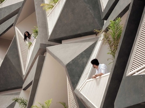 A Jumble Of Unique Balcony Shapes Cover This Building’s Exterior