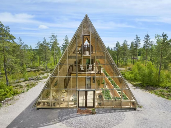 "Naturvillan’s design language was based on following the tapered, pointed triangle-like tops of the conifers," reads the listing. "The form gives, up close, a strong visual architecture with a ver...