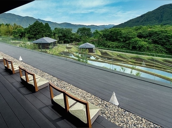 Kengo Kuma scatters hot spring hotel across sculpted rice terraces