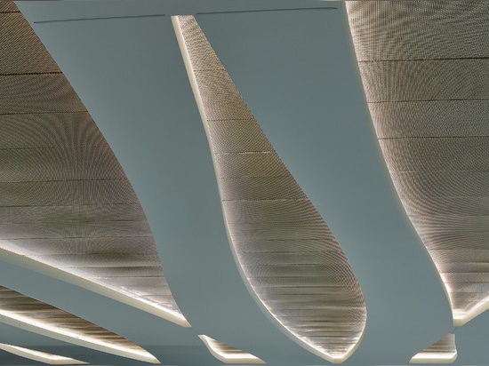 Created using mixed alloys—stainless steel and brass—SZ-4 has a unique weave to the wire mesh ceiling