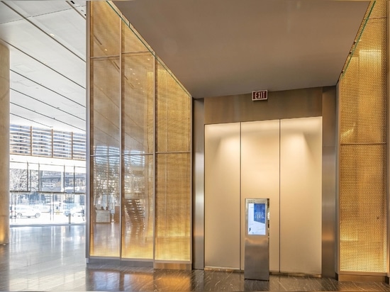 Banker Wire's M22-80 in stainless steel and brass clad against mirrors in the Frost Bank Tower lobby creates a beautiful sparkle and visual interest.