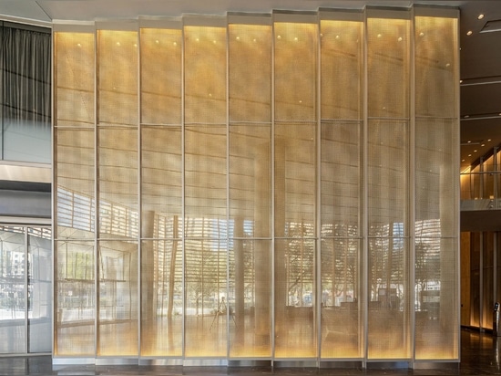 Banker Wire's M22-80 in stainless steel and brass clad against mirrors in the Frost Bank Tower lobby creates a beautiful sparkle and visual interest.