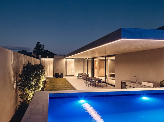 The home's courtyard features an outdoor pool