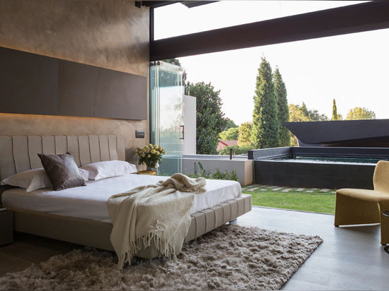 the bedroom opens out towards the pool