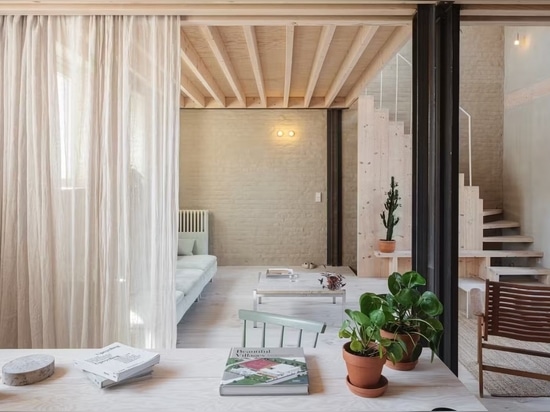 A Ravishing Live/Work Space in Brussels Is Finished With Soils Collected From Building Sites