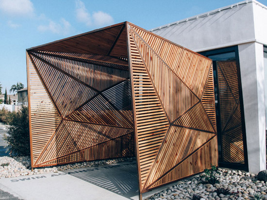 a finely-cut geometric walking establishes the entrance to the restaurant