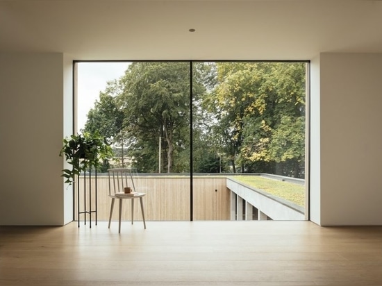 The upper levels overlook the home's green roof