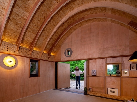 An art gallery occupies the arched space