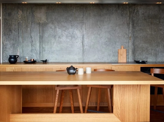 Oak was used to form the kitchen's cabinetry and breakfast counter