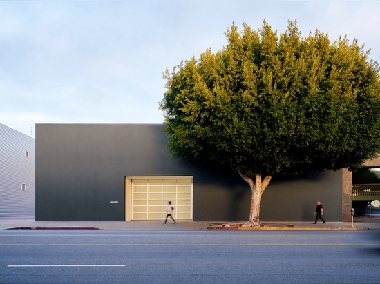 The exterior was replaced with solid walls in grey stucco