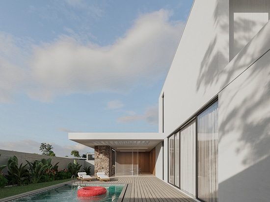 the pool area features composite decking and ceramic tiles