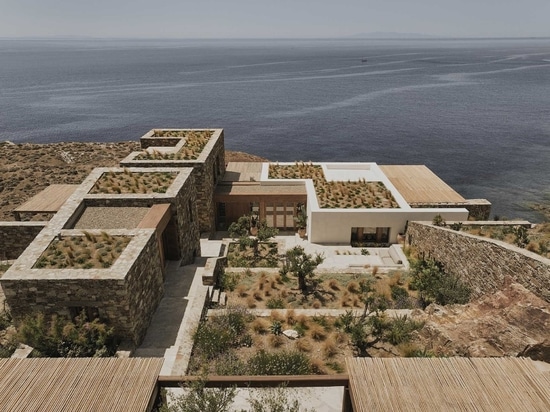 Green Roofs With Native Plants Enhance This Home Built Into A Rocky Hillside