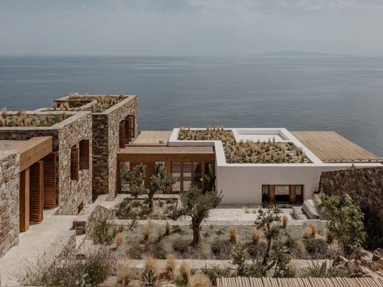 Green Roofs With Native Plants Enhance This Home Built Into A Rocky Hillside