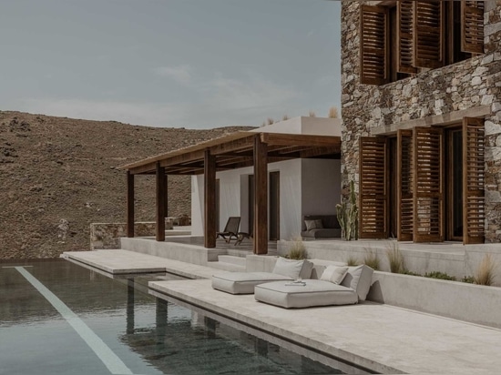 Green Roofs With Native Plants Enhance This Home Built Into A Rocky Hillside