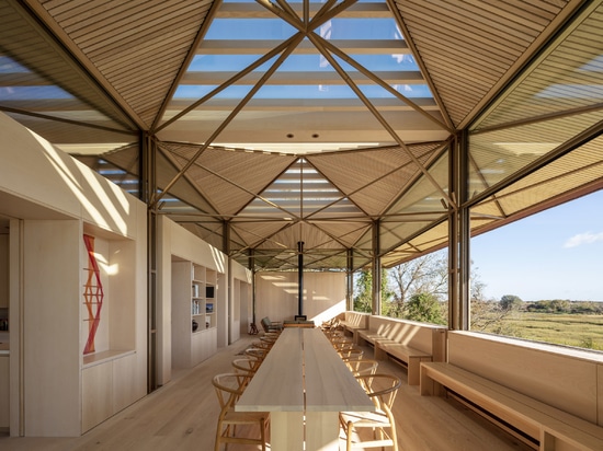 Steel columns and trusses support a copper roof