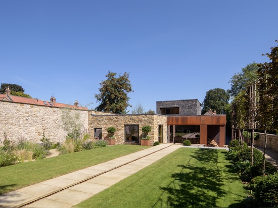 Elliott Architects arranges textural Hushh House around courtyards