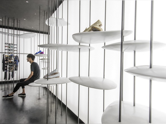 the lower discs serve as a seating area and support when trying on shoes