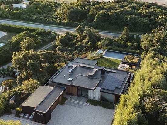 A Green Roof Covers The Pool House At This New Home