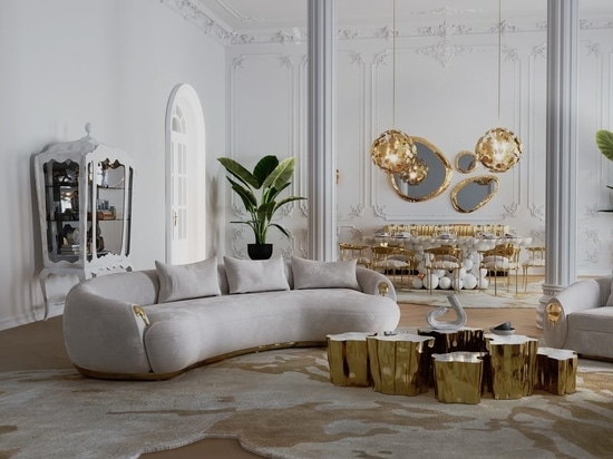 In the heart of this open space, a living room of unparalleled grace takes center stage. A magnificent curved sofa, aptly named Soleil, graces the room with its presence. Its design is a testament ...